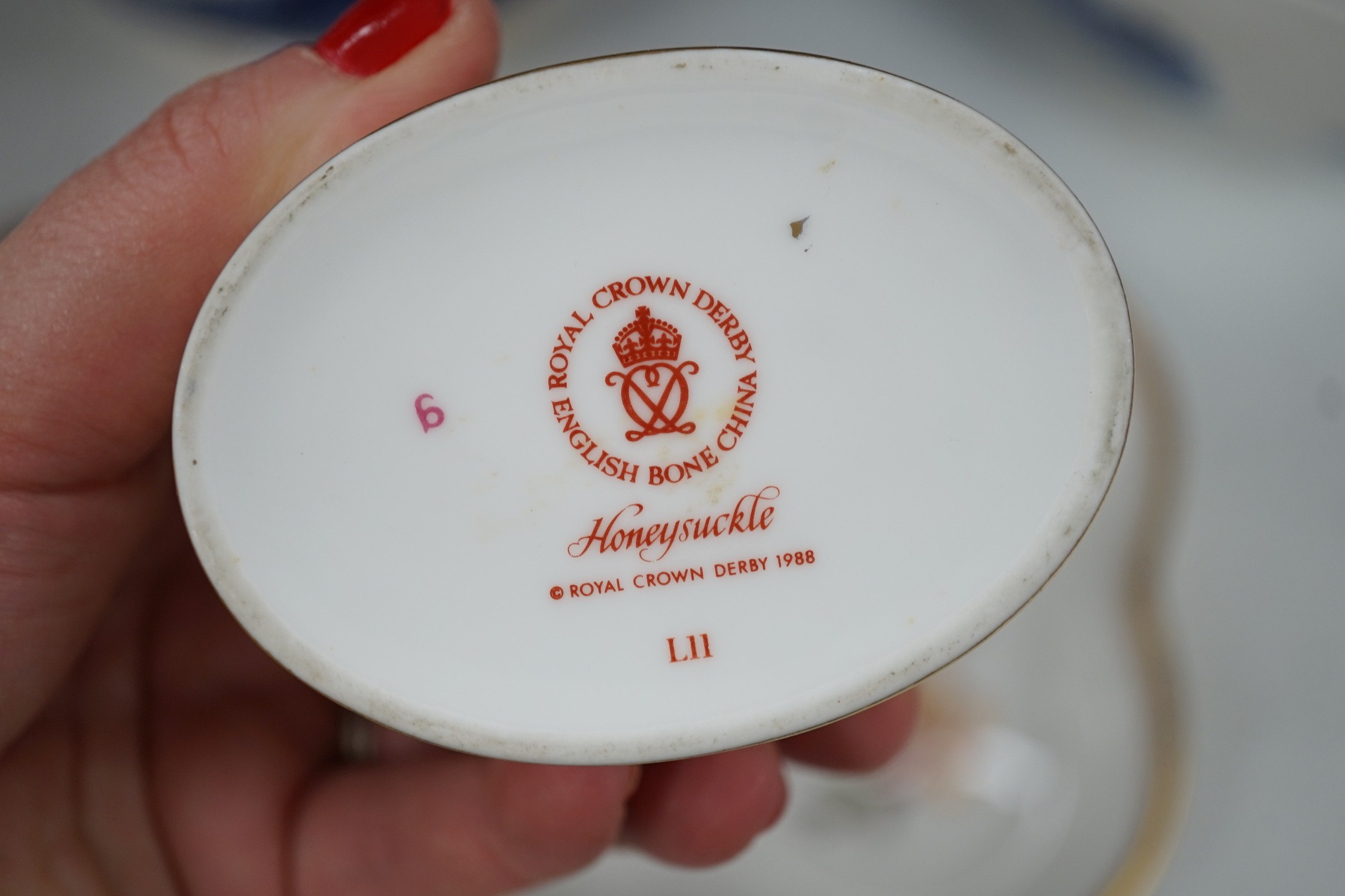 A Royal Crown Derby trinket set, Honeysuckle pattern and a few blue-printed earthenware items including Spode, Maling ware, etc.